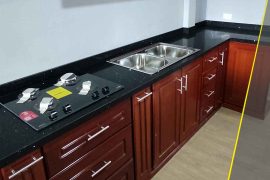01-remodelaciones-edison-cuarzo-negro-estelar-cocina-mueble-madera